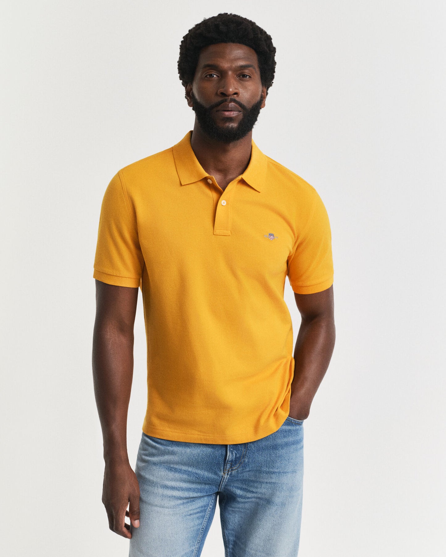 Regular Fit Piqué Poloshirt mit Schildlogo