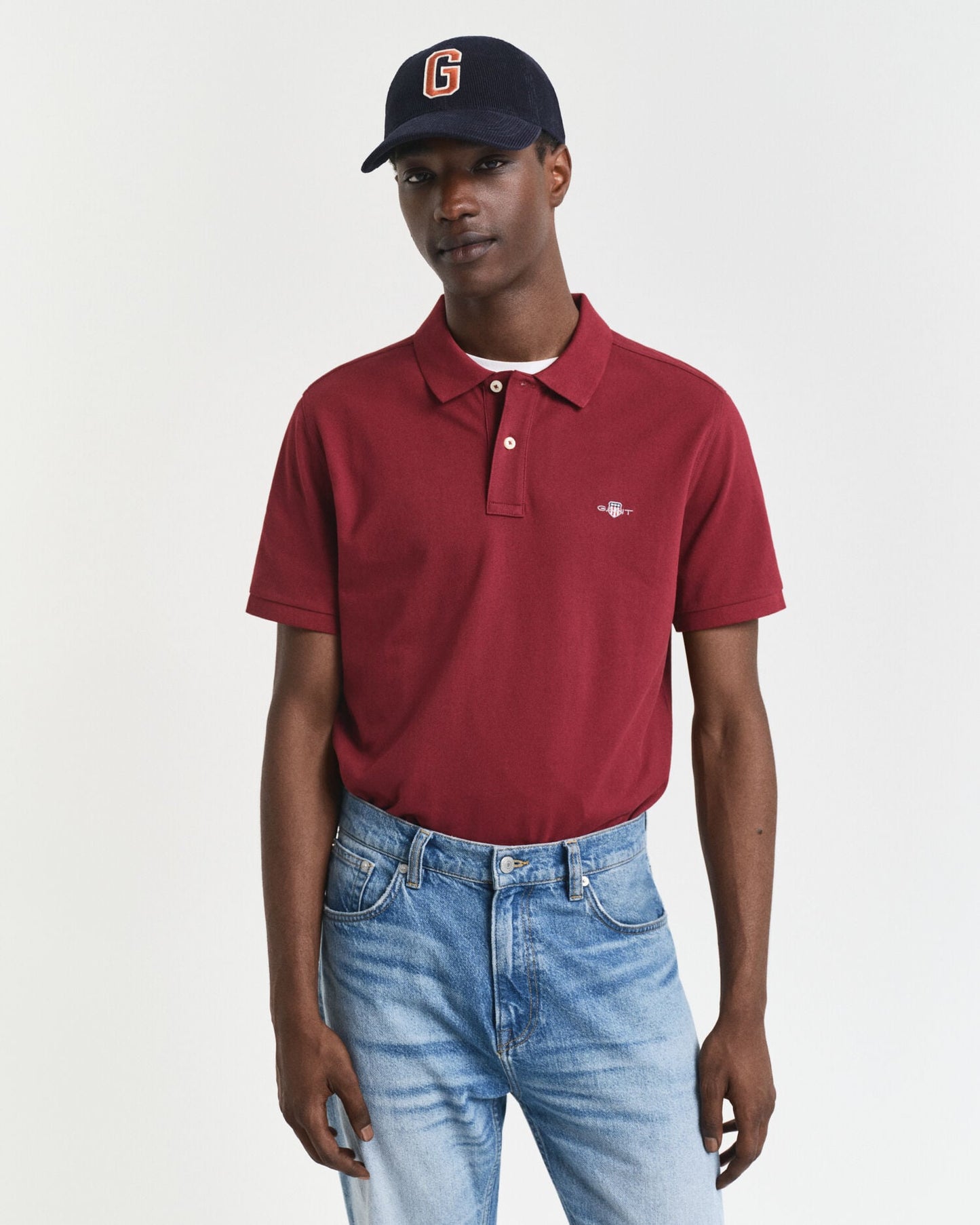Polohemd aus Piqué mit regular fit und Wappenstickerei